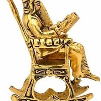 Golden Lord Ganesha Statue Sitting On A Rocking Chair And Reading Ramayan Showpiece